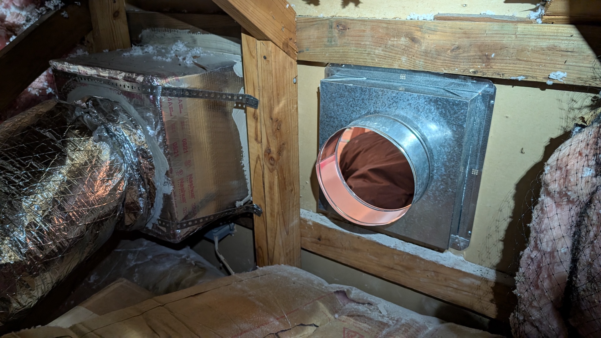 from-attic view of fresh air vent